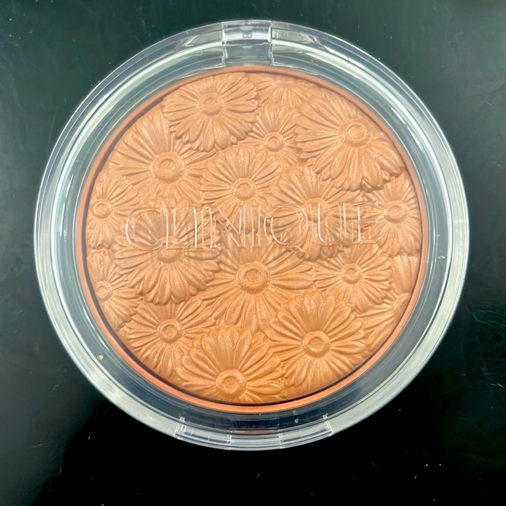 Clinique powder pop flower bronzer “solar pop” color.  New never used